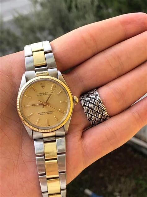 rolex saat erkek altın rengi|Rolex oyster çelik.